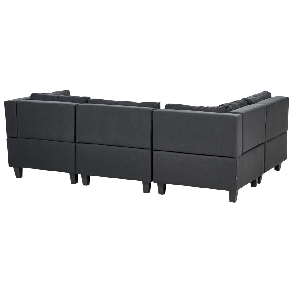 Divano componibile 4 posti imbottito in tessuto nero gambe nere schienale imbottito lato destro stile moderno
