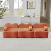Divano modulare senza struttura con seduta profonda, schienali ergonomici e pouf collegabile in velluto arancione