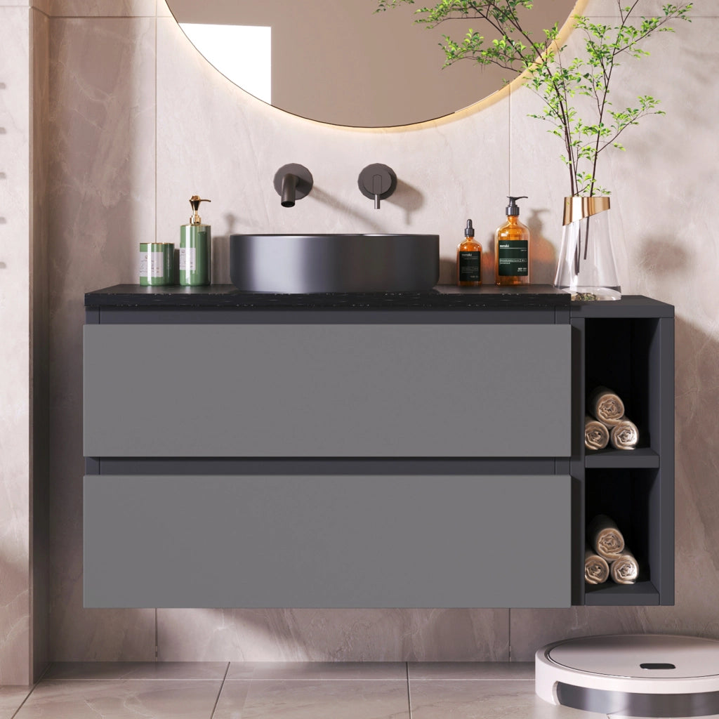 Mobile bagno con lavabo rotondo in ceramica e piano in marmo; nero e grigio