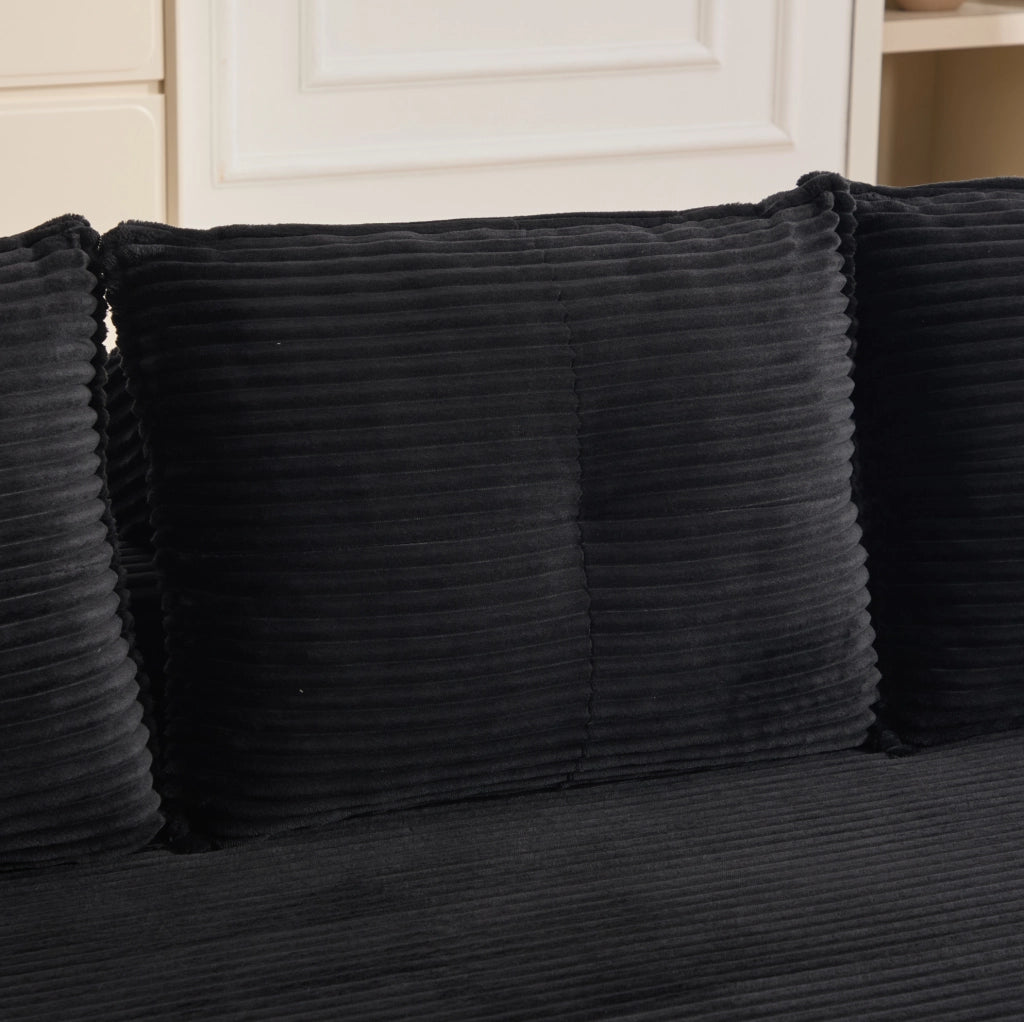 Divano letto ULEVR 232x98 cm in velluto a coste nero con portabevande, tasche laterali e cuscini memory