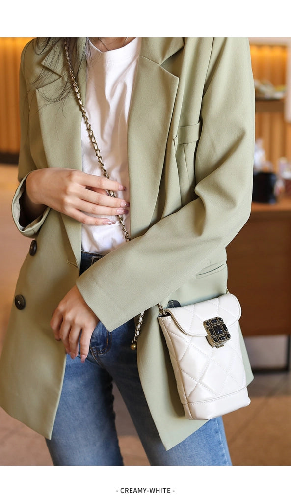Borsa a tracolla in vera pelle, graziosa e con tracolla lunga, colore bianco.