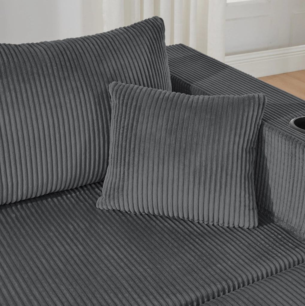 Divano angolare modulare 3 posti a L con 2 pouf mobili; tessuto effetto velluto a coste grigio