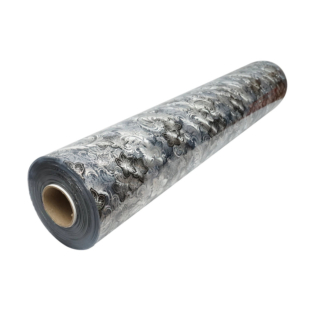 Rotolo pellicola protettiva per tavolo in PVC siliconato trasparente – modello floreale nero Materiale: PVC siliconato trasparente  Dimensioni rotolo: 1,00 × 20 m Breckner Germany