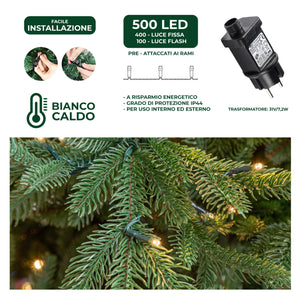 Albero di Natale Artificiale Verde Sestriere H 210cm x L 150cm Super Folto con 500 Luci Led + 20 Luci Flash Incorporate 2640 Tips e Base a Croce in Metallo