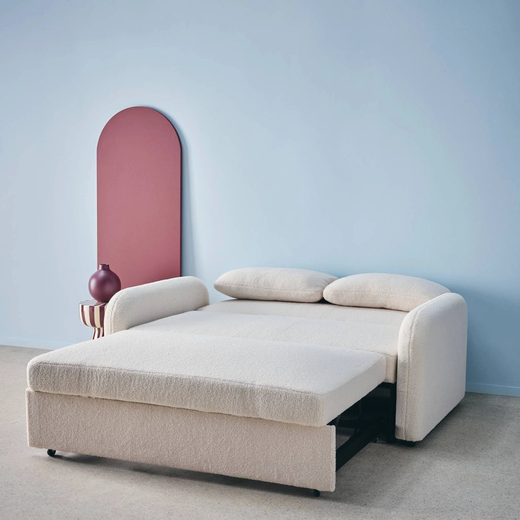 Divano letto arrotondato in tessuto bouclé, 2 posti, crema