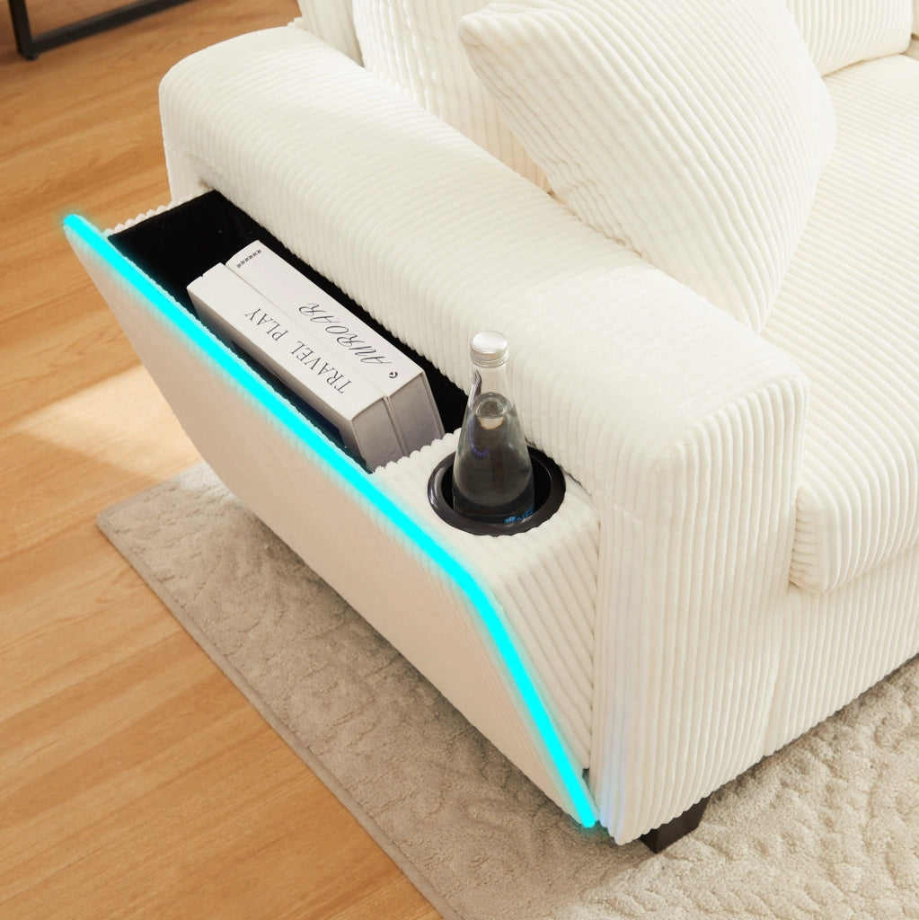 Divano a U 334x128,5 cm in velluto a coste beige con LED, USB/Type-C e 2 pouf