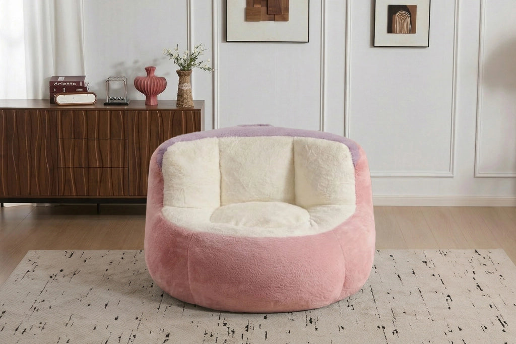 Poltrona pouf con imbottitura in schiuma sminuzzata, maniglia e base antiscivolo, in pelliccia sintetica multicolore