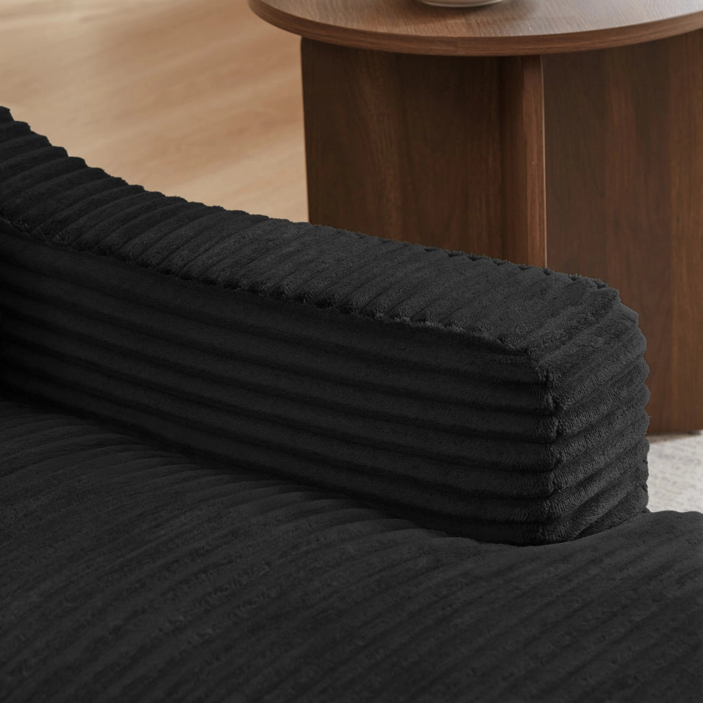 Poltrona lounge trasformabile in velluto a coste nero