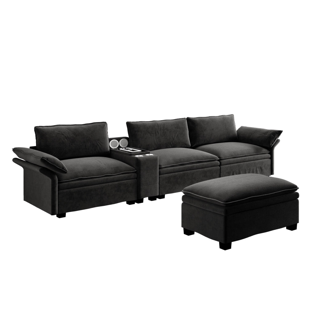 Divano modulare angolare 4 posti in chenille nero con pouf, ricarica wireless, altoparlanti Bluetooth e luci dimmerabili