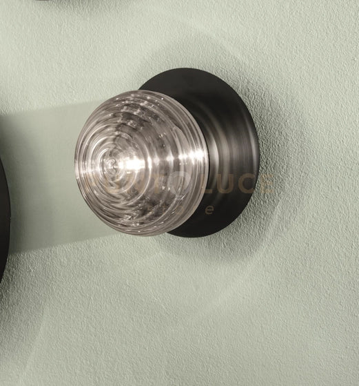 APPLIQUE TONDO BASE NERO VETRO FUME' 1 LUCE ATTACCO E14