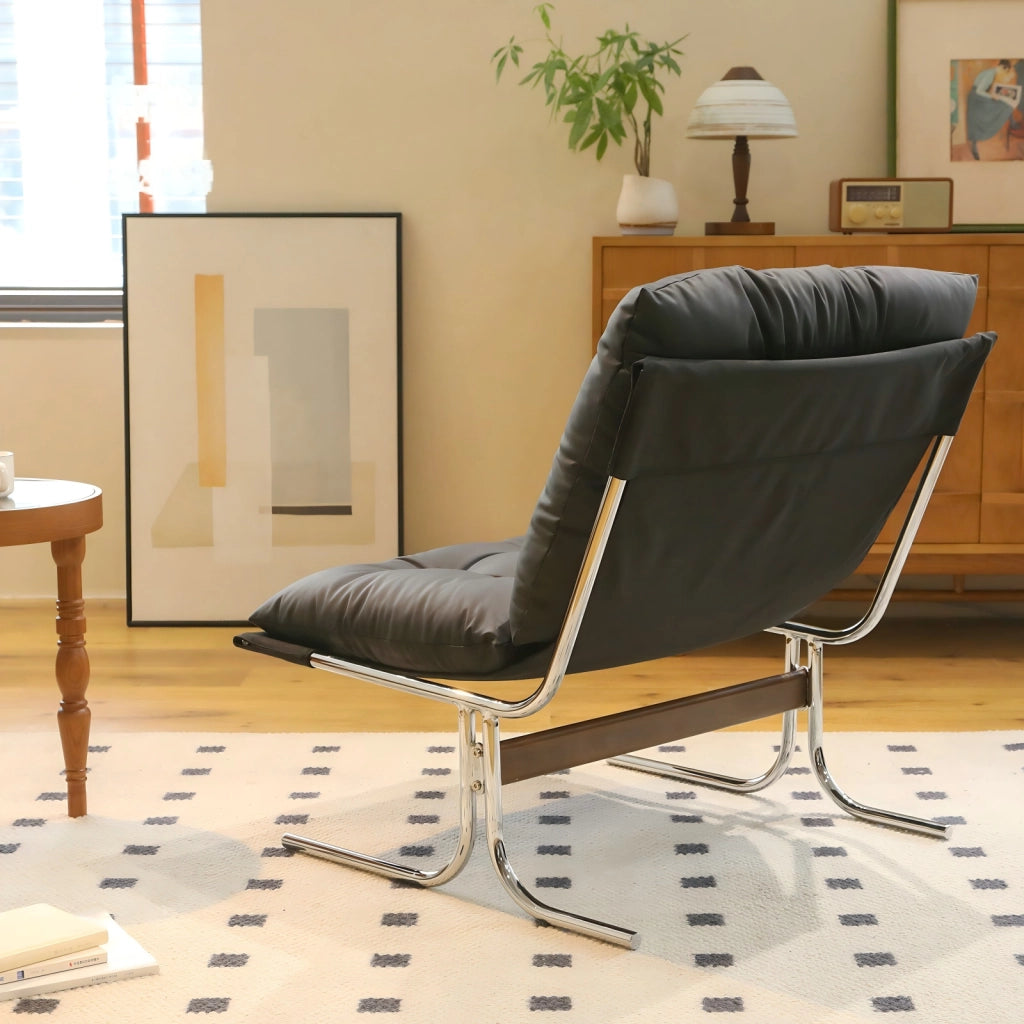 Poltrona con rivestimento rimovibile e gambe in cromo nero