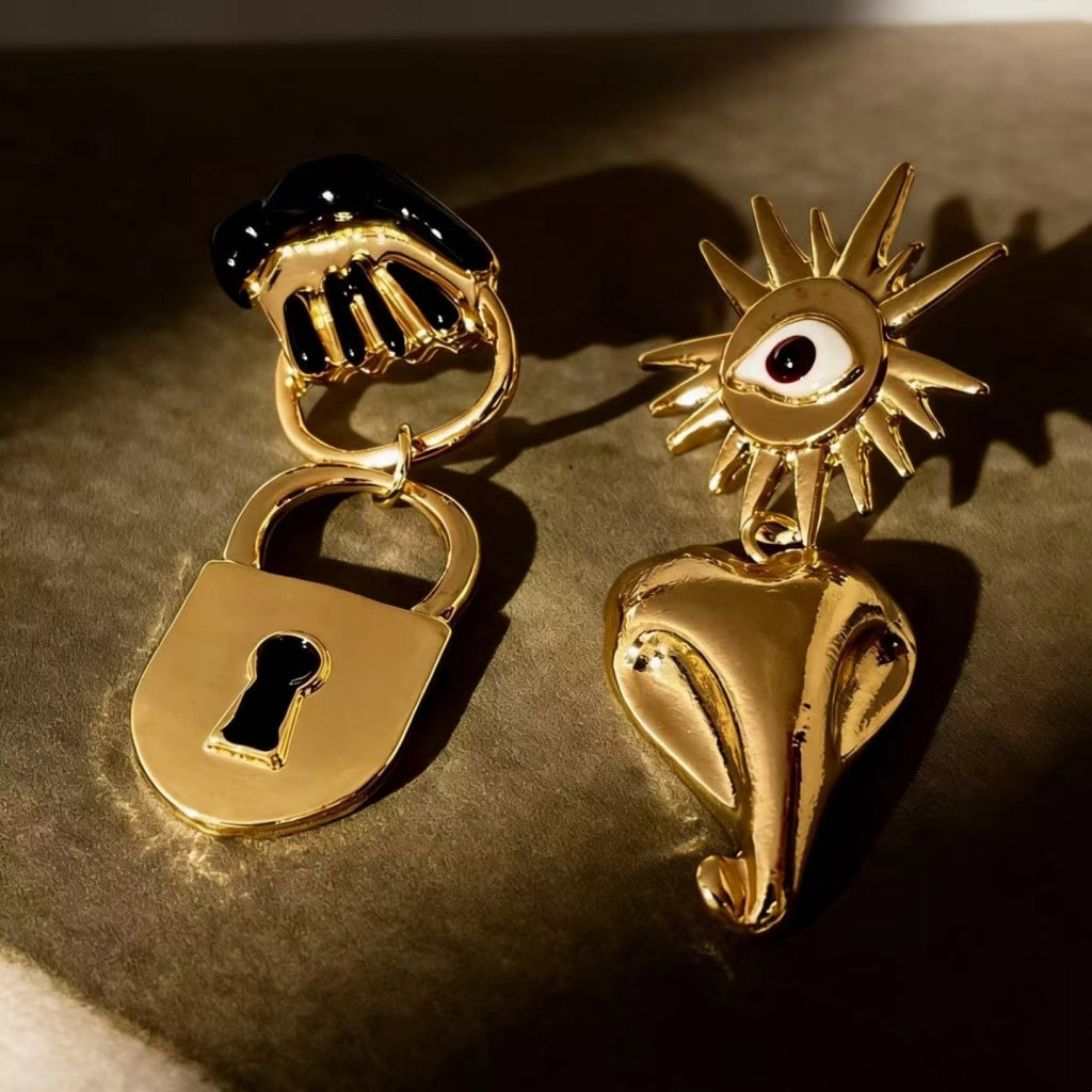 Orecchini vintage asimmetrici a forma di occhio di girasole