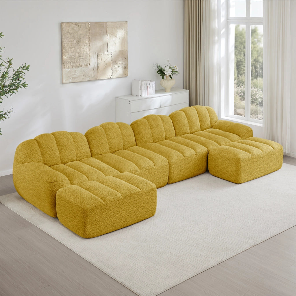 Divano angolare modulare a 4 posti con ottomano; schienale ergonomico; in pile granulato giallo