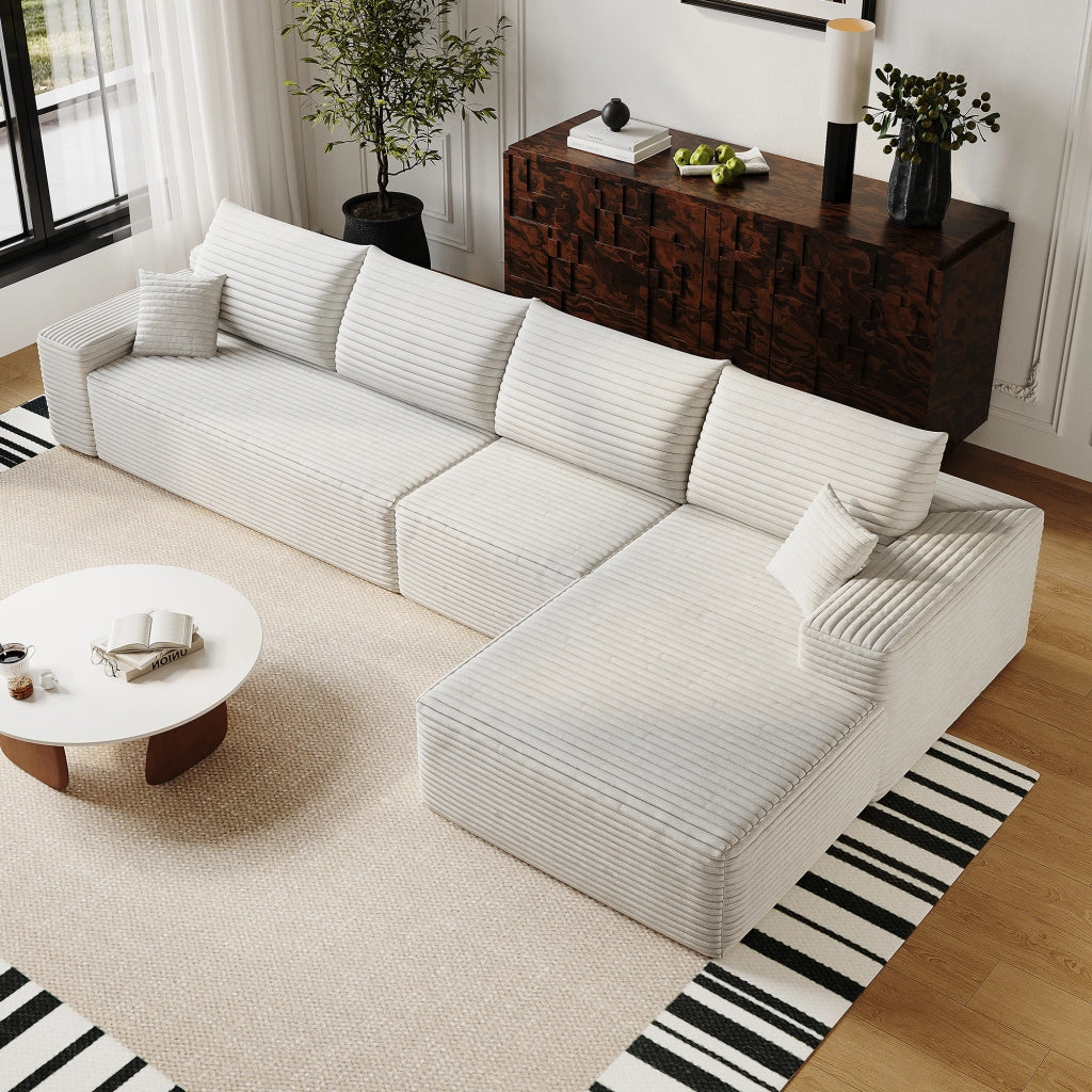 Divano angolare modulare in tessuto con schiuma ad alta elasticità e chaise longue a L bianco per soggiorno