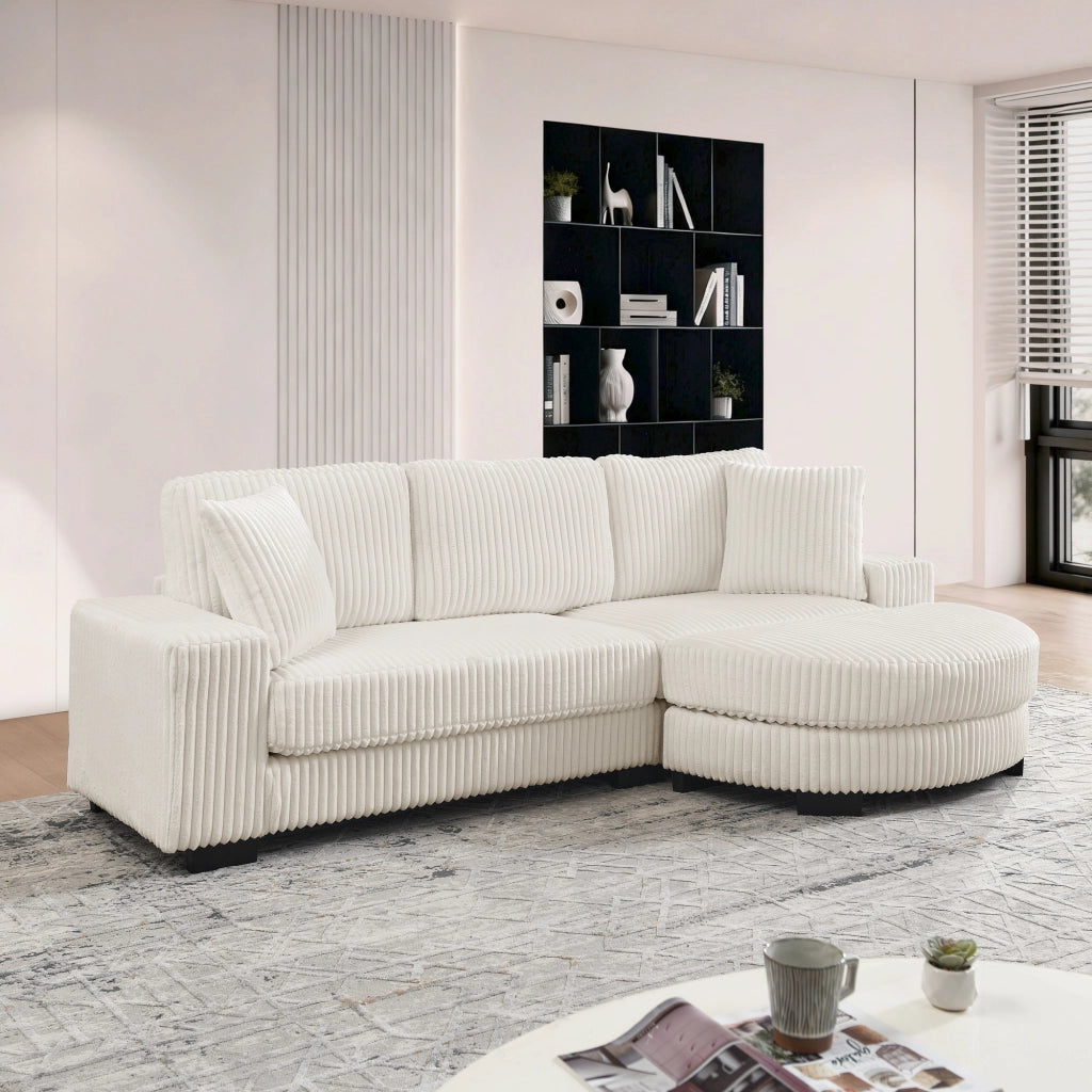 Divano angolare modulare 4 posti con pouf ovale reversibile e 2 cuscini in corduroy beige per soggiorno