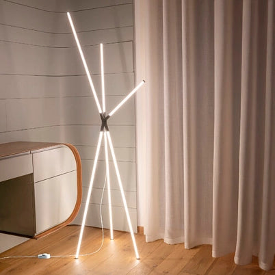 Brilliant Lampada da terra di design a treppiede con diffusori cilindrici in policarbonato e struttura in alluminio finitura Oro, tecnologia LED