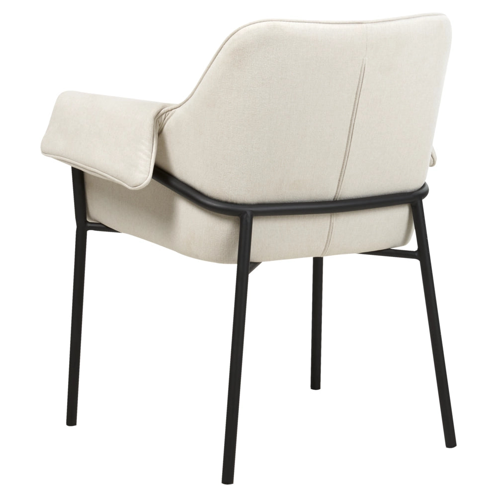 Poltrona da salotto con poggiatesta in tessuto beige con gambe nere elegante soggiorno glamour