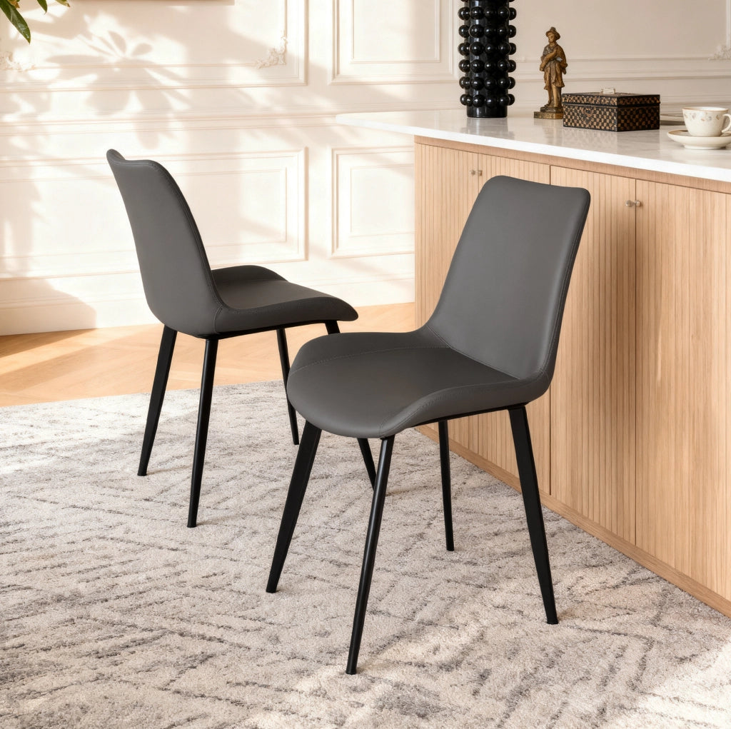 Sedia da pranzo ergonomica in PU grigio con gambe in acciaio al carbonio