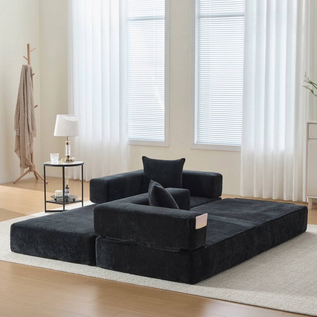 Divano modulare in chenille nero con tasche laterali e base antiscivolo; 198x79x60 cm