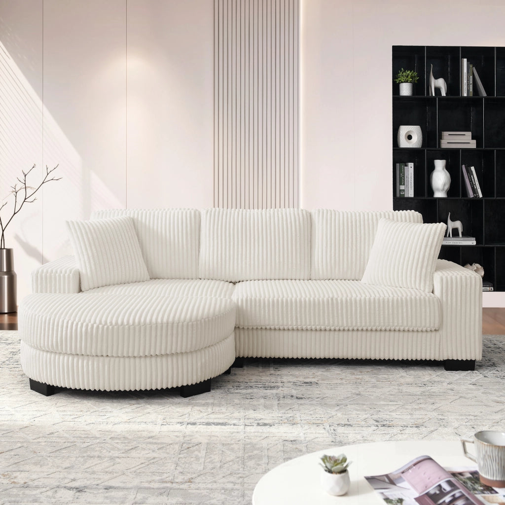 Divano angolare modulare a 4 posti in corduroy beige con pouf ovale reversibile e 2 cuscini 256,5 × 133,5 × 89 cm
