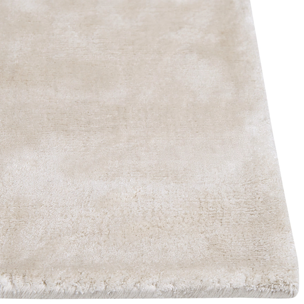 Tappeto in viscosa beige chiaro 80 x 150 cm a pelo corto capitonné moderno