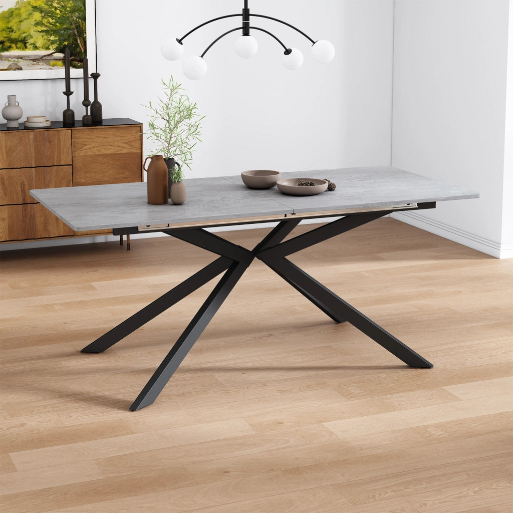 Tavolo da pranzo estensibile in MDF con gambe incrociate, finitura effetto cemento, nero/grigio, 150/180 x 70 x 76 cm