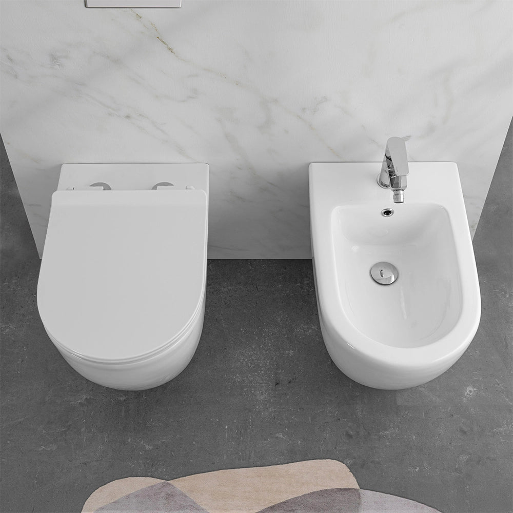 Wc e bidet filomuro per anziani con scarico traslato serie Comoda