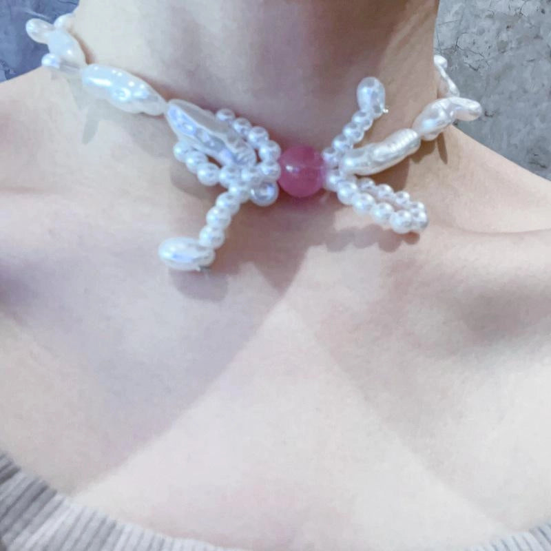 Collana con fiocco di perle rosa fatta a mano, regalo di Natale o di compleanno.