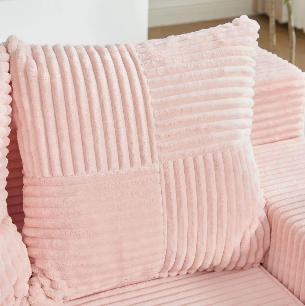 Divano pouf rosa in velluto a coste con 2 cuscini e tasche laterali 151x133x64 cm