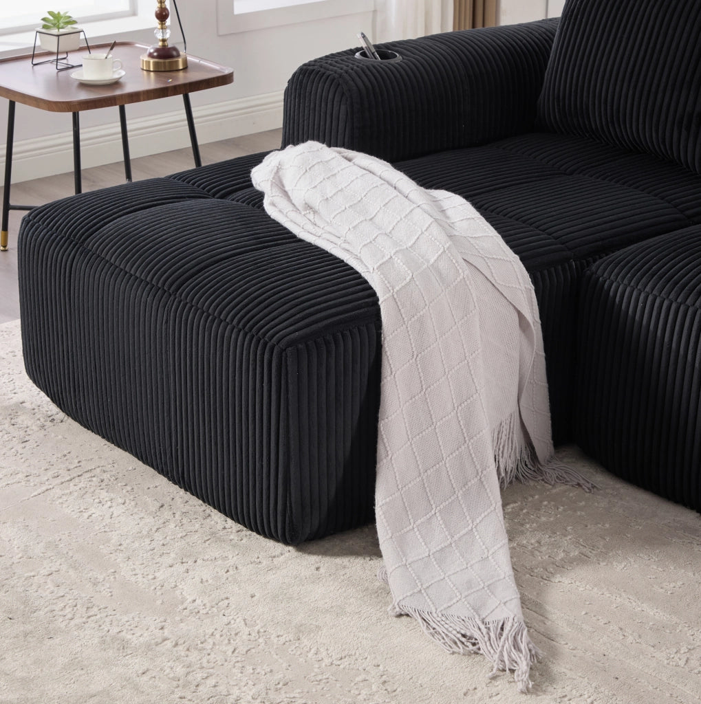 Sofa modulare in corduroy nero con tasche laterali e portabicchieri; 253 x 158 x 61 cm