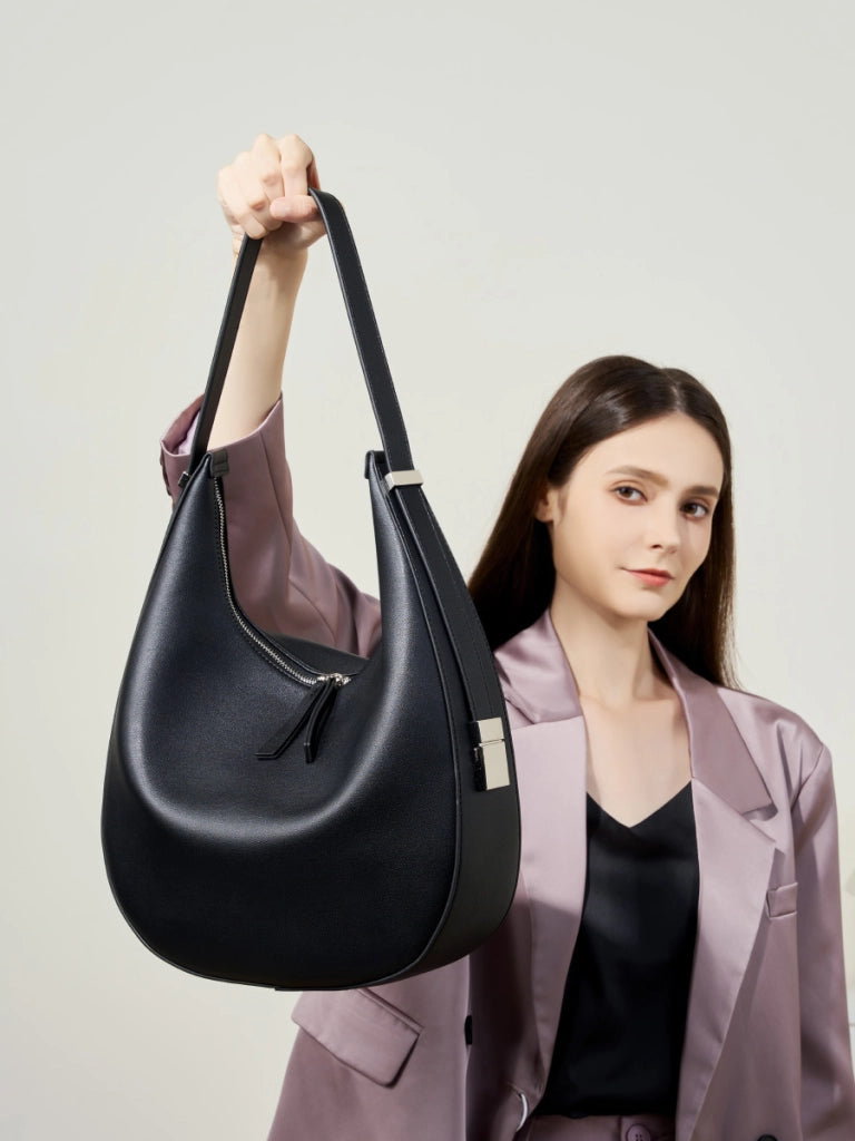 Borsa a mano da donna in vera pelle, colore nero.