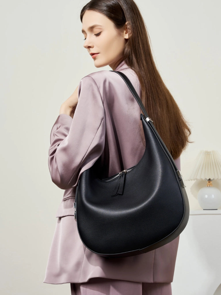 Borsa a mano da donna in vera pelle, colore nero.