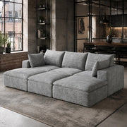 Divano modulare in tessuto grigio con imbottitura in schiuma e design componibile