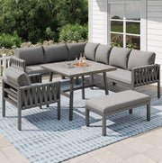 Set da giardino in metallo e poliestere con divano angolare; tavolo in vetro temperato; grigio