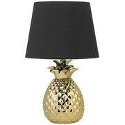 Lampada da tavolo decorativa dorato con base in ceramica nera lucida paralume in poliestere a forma di ananas dal design eclettico