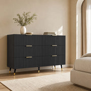 Credenza moderna con 6 cassetti in truciolare nero, gambe alte e dettagli dorati 120 × 40 × 77 cm