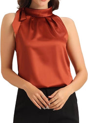 Blusa elegante senza maniche per donna in seta con collo alto e scollo a rete