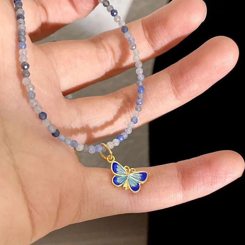 Collana in porcellana sfumata fatta a mano: gioiello impilabile con perline irregolari