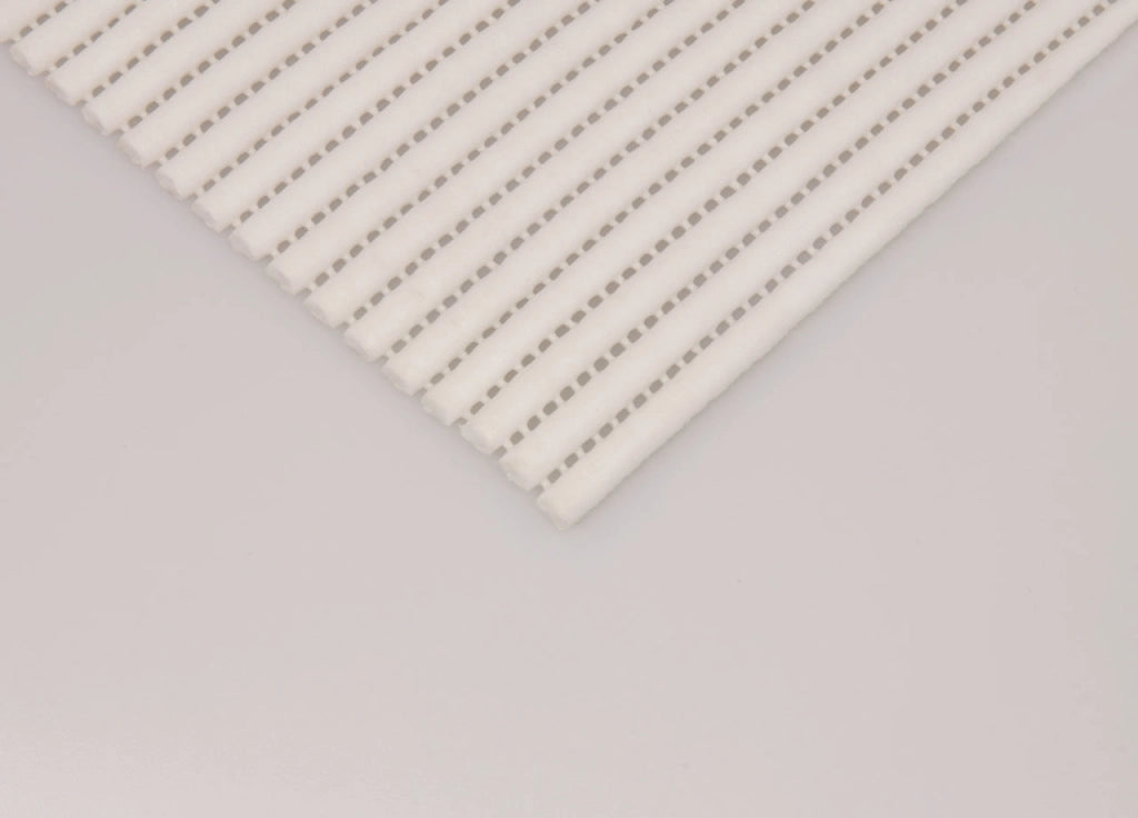 Tappetino Gommato Antiscivolo Multiuso Per Cassetti e Superfici Colore  Bianco - 65x400cm - Bianco