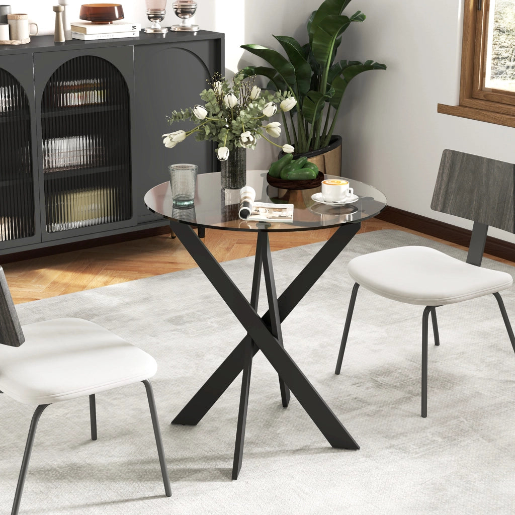Tavolo da pranzo - rotondo per 4 - piano in vetro temperato - gambe in acciaio - Ø70x75 cm - nero+trasparente