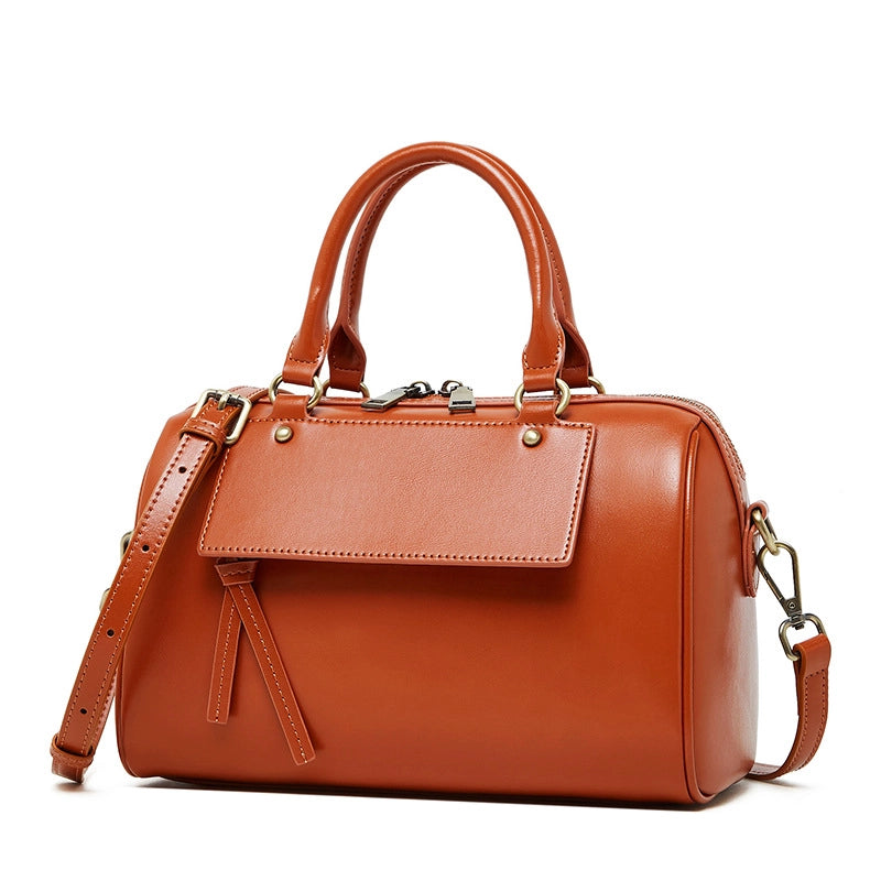 Borsa a tracolla da donna in vera pelle, colore arancione.