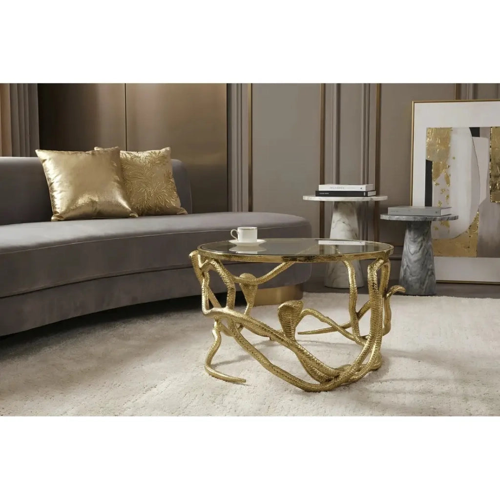Tavolino basso VIPEREA rotondo 67 cm dorato con serpenti in alluminio e vetro temperato