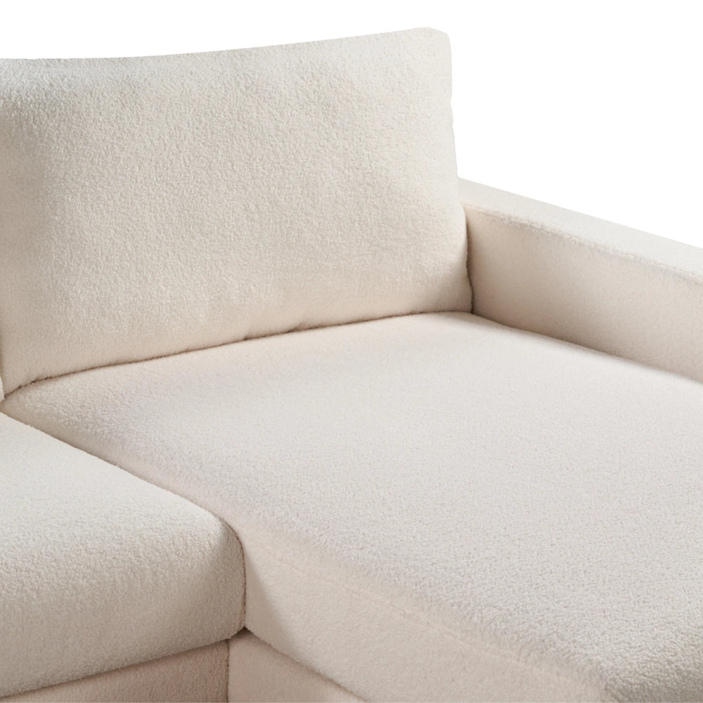 Divano angolare sinistro Rivestimento in bouclé bianco Gambe in legno Elegante