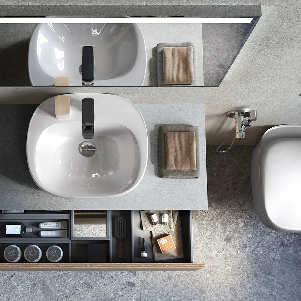 Lavabo ovale 65 cm d’appoggio bianco in ceramica Rak Illusion