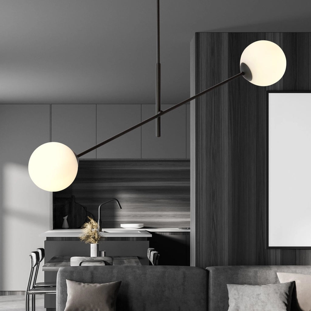 Lampada a sospensione LINEAR con struttura in acciaio nero e sfere in vetro