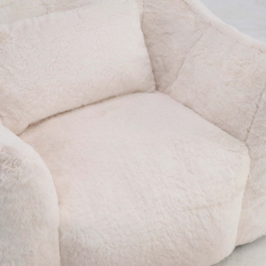 Poltrona pouf in pelliccia sintetica con design ergonomico e imbottitura in schiuma ad alta densità beige