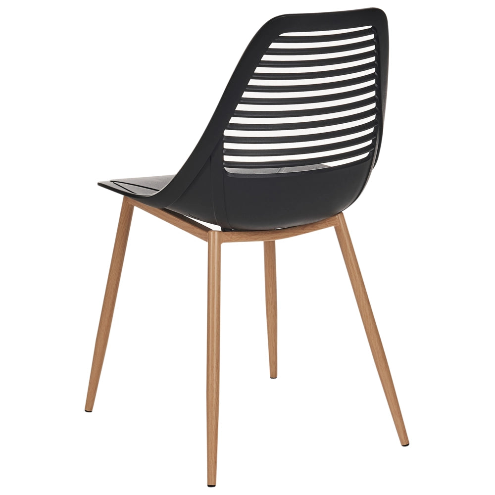 Set di 4 sedie da pranzo Seduta sintetica nera Gambe in metallo Seduta moderna semplice e minimalista