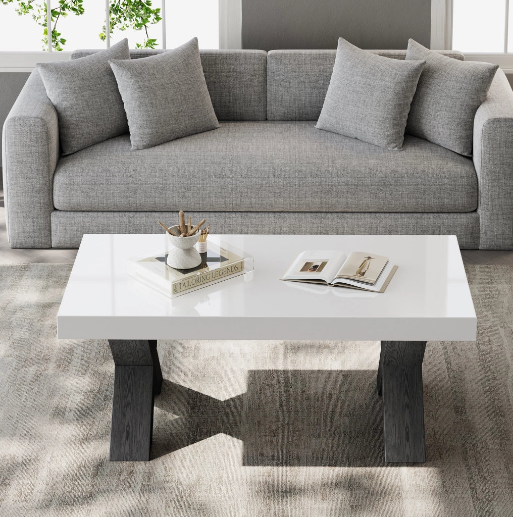 Tavolino da caffè 100x50x40 cm con piano lucido e gambe a X in MDF bianco e nero