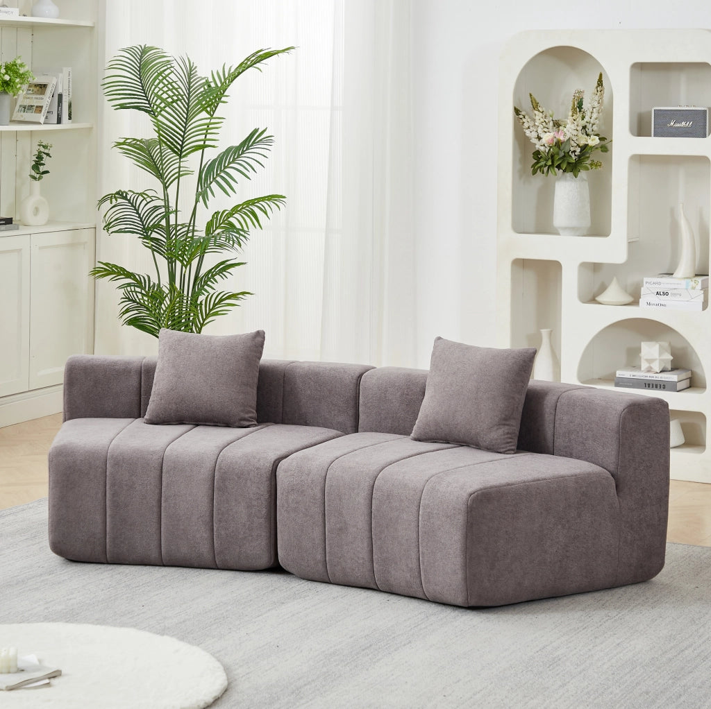 Modulo divano curvo modulare in chenille grigio con 2 cuscini, design a semicerchio