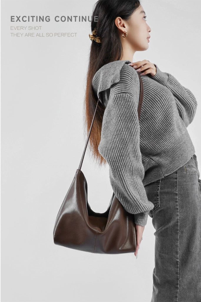 Borsa a tracolla da donna in vera pelle, colore marrone.